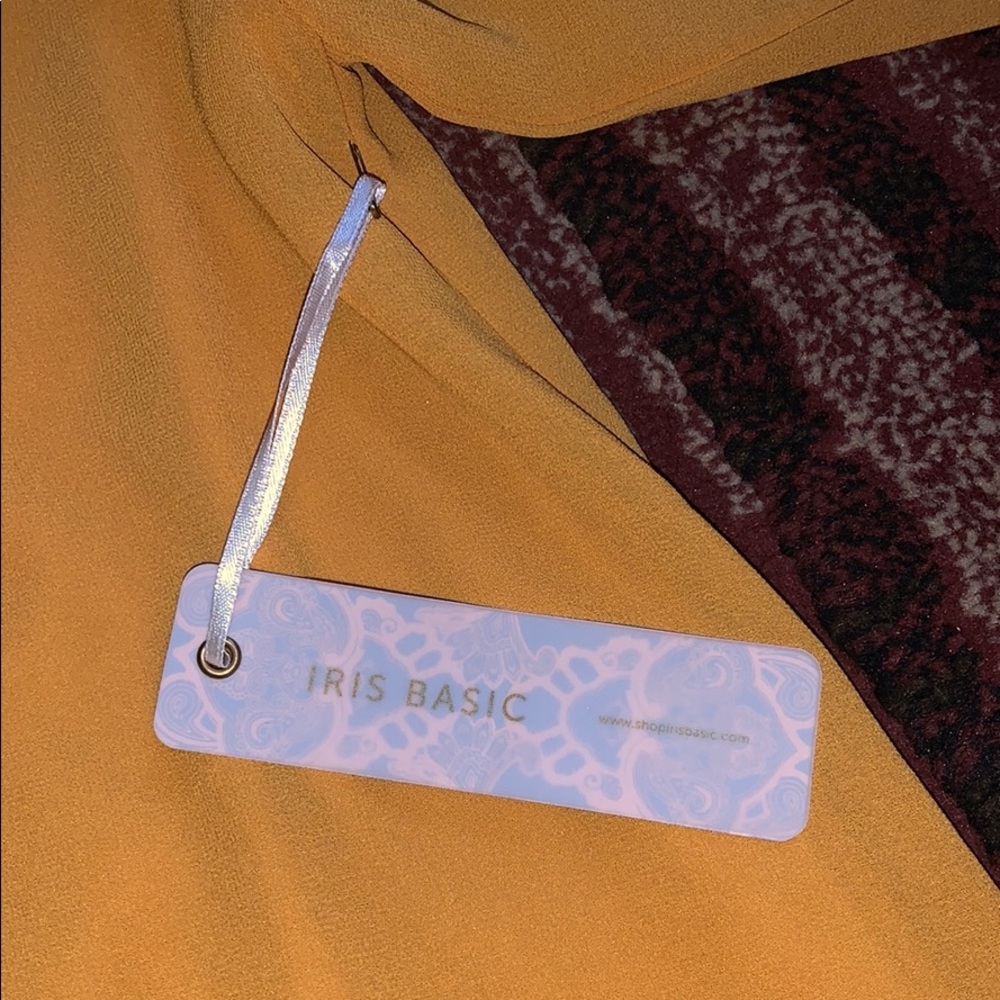 Mustard color blouse .